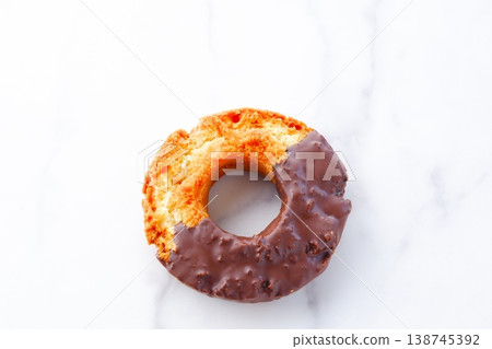 Donuts and Coffee - Chocolate-covered old-fashioned donuts and coffee Donuts and Coffee - Chocolate-covered old-fashioned donuts and coffee 138745392