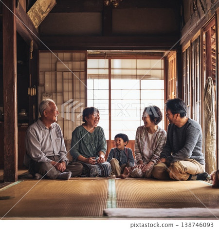 Smiling faces of a three-generation family relaxing in a traditional Japanese house. Smiling faces of a three-generation family relaxing in a traditional Japanese house. 138746093
