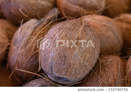 Discovering the natural beauty of coconut husks, a raw material rich in texture and potential for crafts and decoration Discovering the natural beauty of coconut husks, a raw material rich in texture and potential for crafts and decoration 138746556