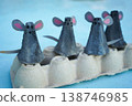 A family of mice, hand-made from a cardboard egg box, close-up. An eco-friendly idea for reuse, decorations for Easter, a gift for dad, mom, on family day. 138746985