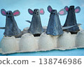 A family of mice, hand-made from a cardboard egg box, close-up. An eco-friendly idea for reuse, decorations for Easter, a gift for dad, mom, on family day. 138746986