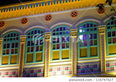 Ornate Building Facade with Stained Glass Windows Ornate Building Facade with Stained Glass Windows 138747027