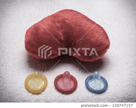 Colorful condoms and red heart Colorful condoms and red heart 138747157