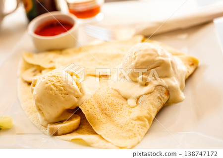 Pancake with ice cream and strawberry sauce 138747172