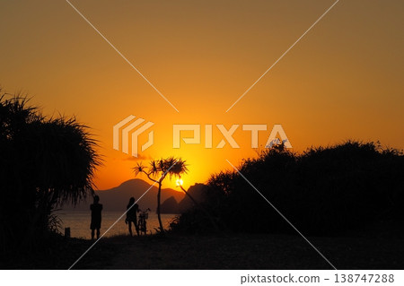 Sunset and people at Ama Beach on Zamami Island: A scene from Okinawa 138747288