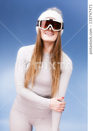 woman in thermal underwear ski googles woman in thermal underwear ski googles 138747471