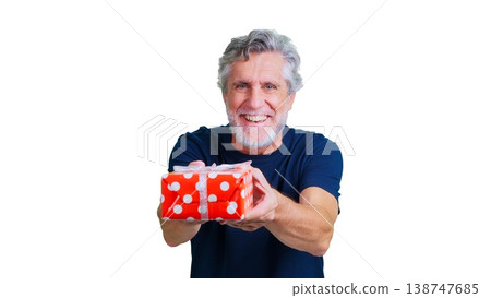 Senior man smiling offering present gift box Senior man smiling offering present gift box 138747685