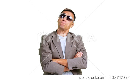 Man with sunglasses showing smug arrogant expression Man with sunglasses showing smug arrogant expression 138747854