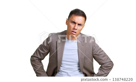 Businessman looking confused and frustrated, posing with hands on hips Businessman looking confused and frustrated, posing with hands on hips 138748220