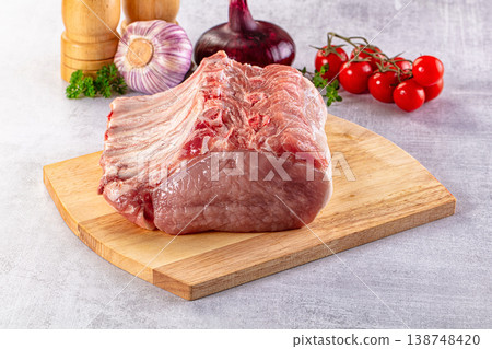 Raw pork loin with bone 138748420