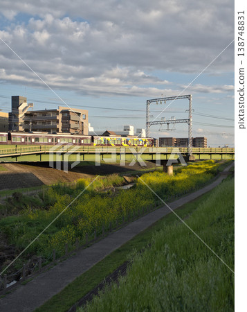 Hankyu train crossing the iron bridge 138748831