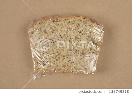 Top View of a Sandwich Wrapped in Plastic Top View of a Sandwich Wrapped in Plastic 138749218
