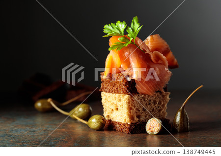 Open sandwich with smoked salmon and capers. 138749445
