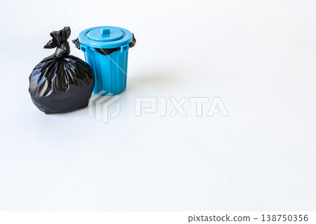 Garbage bags and trash cans on a white background 138750356