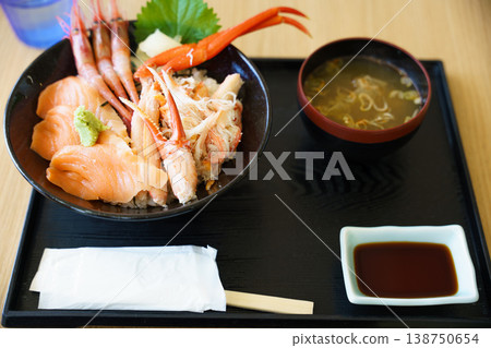 A luxurious seafood bowl featuring fresh seafood. A luxurious seafood bowl featuring fresh seafood. 138750654