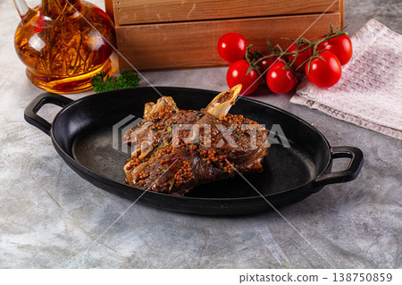 Baked lamb leg with spices Baked lamb leg with spices 138750859
