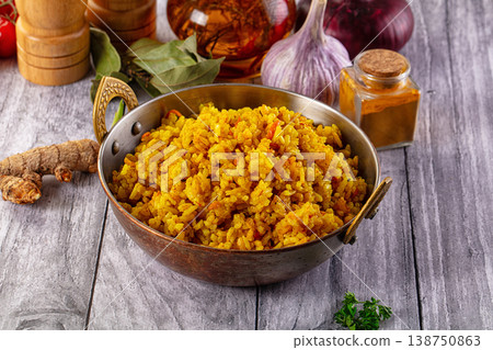 Indian yellow curry rice with tumeric Indian yellow curry rice with tumeric 138750863