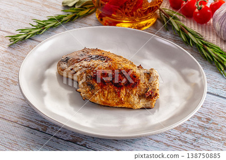Roasted pork schnitzel steak piece 138750885
