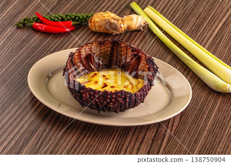 Baked sea urchin with cheese and egg 138750904