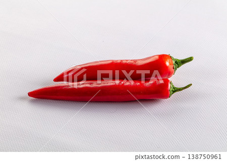 Raw fresh red paprika pepper 138750961