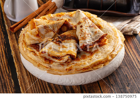 Thin homemade golden pancaces stack Thin homemade golden pancaces stack 138750975