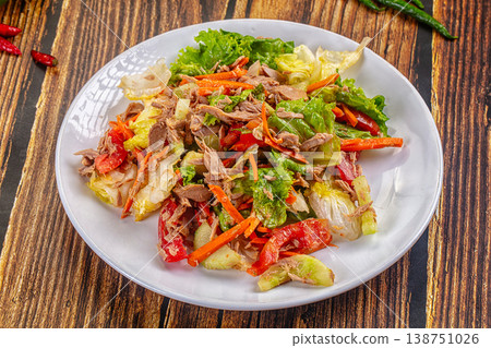 Fresh Tuna Salad with Vegetables in a Bowl on a Rustic Wooden Table Fresh Tuna Salad with Vegetables in a Bowl on a Rustic Wooden Table 138751026