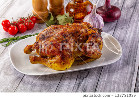 Hot tasty grilled whole chicken 138751059