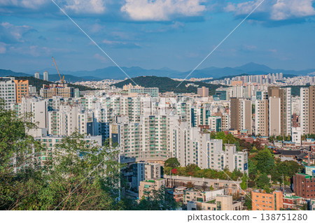 Seoul, South Korea - Oct. 25, 2025 : High-angle view of Seoul city skyline with dense office buildings and mountains in Jongno. 138751280
