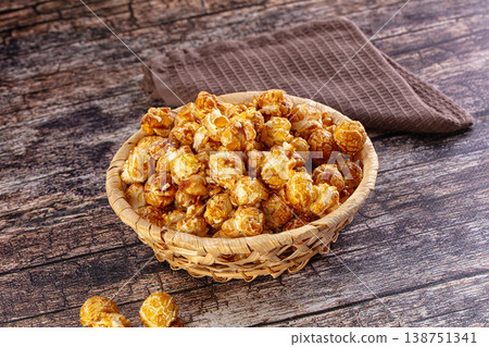 Sweet crunchy popcorn with caramel Sweet crunchy popcorn with caramel 138751341