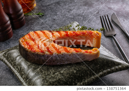 Grilled salmon steak served thyme Grilled salmon steak served thyme 138751364