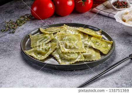 Italian dumplings ravioli with spinach 138751369