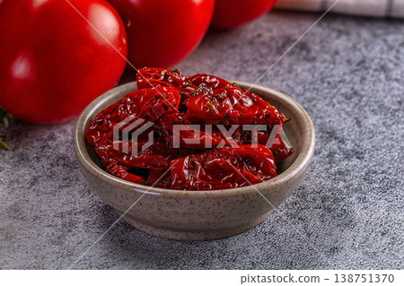 Dry tomato in olive oil 138751370