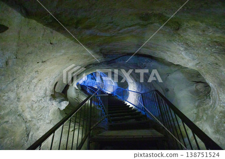 Entrance and stairs in Ancient cave complex Uplistsikhe. Ancient Georgian city carved into the rock Entrance and stairs in Ancient cave complex Uplistsikhe. Ancient Georgian city carved into the rock 138751524