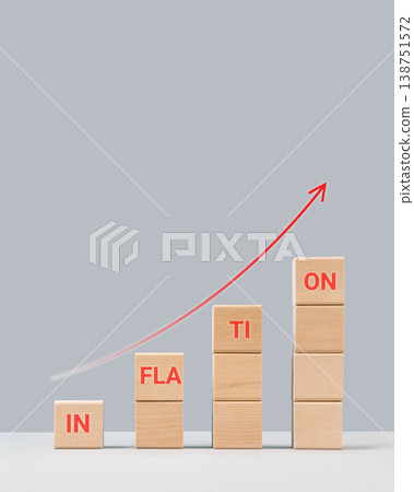 Wooden block and the word inflation on a gray background. Increase in interest rates. Global economy, bankruptcy and controlling inflation. 138751572
