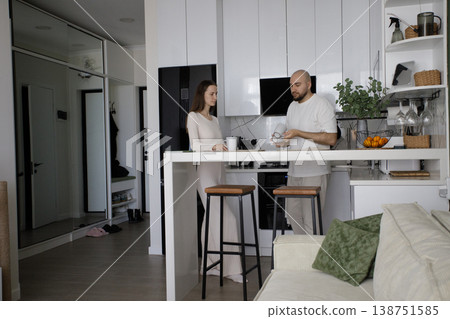 Attractive wife and husband at home Attractive wife and husband at home 138751585