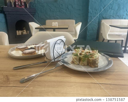 pancakes with salmon for breakfast in cafe pancakes with salmon for breakfast in cafe 138751587