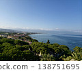 Picturesque view of turkey coast, Kusadasi, Audin, blue sea and mountain on horizon in mist. Calm water surface, background for traveling and vacation, Beautiful sea view, sea in sunny day. 138751695