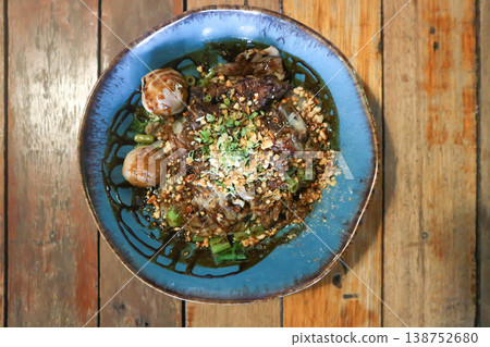 dry noodles or plain noodles, Chinese noodle with meatball and beef or noodles without soup dry noodles or plain noodles, Chinese noodle with meatball and beef or noodles without soup 138752680