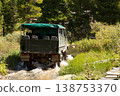 Off road trip in GAZ 66 climbing to Karakol lake in sunny summer day. Heavy powerful truck terrain vehicle with wheels. Old Military car now a touristic transport. Republic Gorny Altai, Russia. Asia 138753370