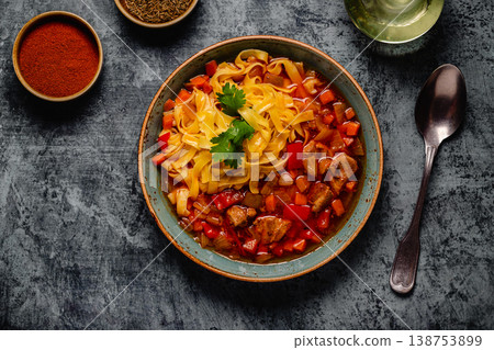 Lagman soup with lamb, homemade noodles and vegetables. Lagman soup with lamb, homemade noodles and vegetables. 138753899