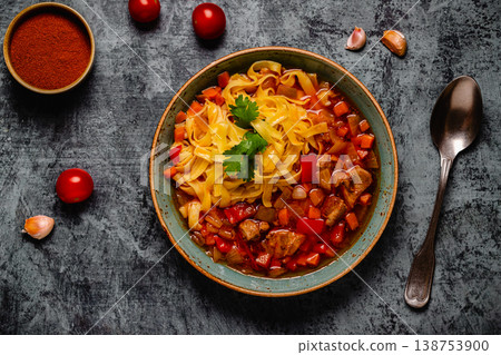 Lagman soup with lamb, homemade noodles and vegetables. Lagman soup with lamb, homemade noodles and vegetables. 138753900