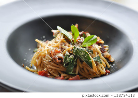 bacon spaghetti ,spaghetti or spicy spaghettior spicy pasta or bacon pasta with chili and sweet basil bacon spaghetti ,spaghetti or spicy spaghettior spicy pasta or bacon pasta with chili and sweet basil 138754118