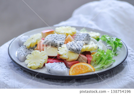 fruit salad or fruit and vegetable salad or dragon fruit , pineapple and apple salad fruit salad or fruit and vegetable salad or dragon fruit , pineapple and apple salad 138754196