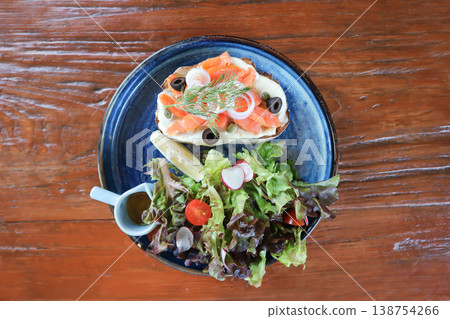 smoked salmon with bread and salad or salmon sandwich 138754266