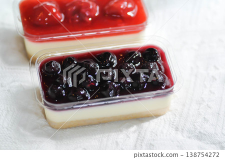strawberry cheese cake , strawberry cheese pie or strawberry cheesecake and blueberry cheesecake with blueberry in the box strawberry cheese cake , strawberry cheese pie or strawberry cheesecake and blueberry cheesecake with blueberry in the box 138754272