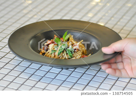 bacon spaghetti ,spaghetti or spicy spaghettior spicy pasta or bacon pasta with chili and sweet basil 138754505