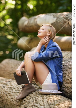 Nature woman, park and relax with book journal about natural wellness, stress relief or summer travel. Study notebook, tree log and person inspiration for creative spring story, notes or sunshine Nature woman, park and relax with book journal about natural wellness, stress relief or summer travel. Study notebook, tree log and person inspiration for creative spring story, notes or sunshine 138755125