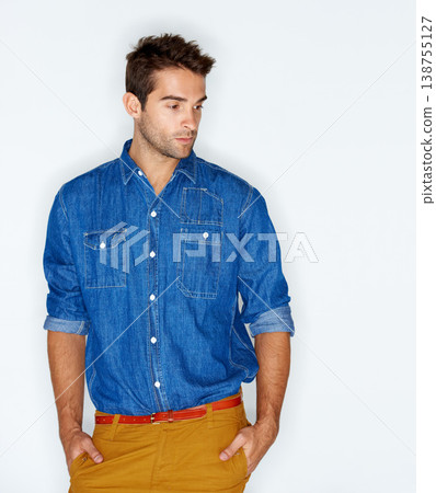 Thinking, stylish and a man with clothes for fashion, trendy and denim on a white background. Young, cool and a person or model with an idea, shirt or hipster clothing on a backdrop for style 138755127
