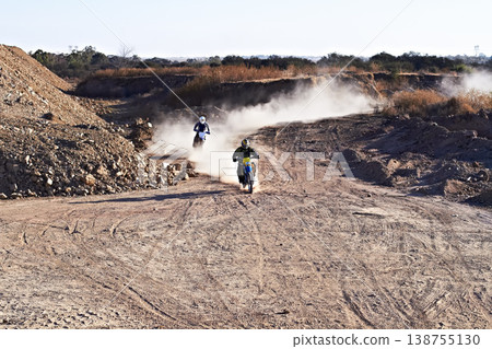 Fitness, sand and motorbike for sports with action for challenge or competition with power. Speed, performance and desert with bike for race or adventure in outdoor with freedom or fearless driving. Fitness, sand and motorbike for sports with action for challenge or competition with power. Speed, performance and desert with bike for race or adventure in outdoor with freedom or fearless driving. 138755130