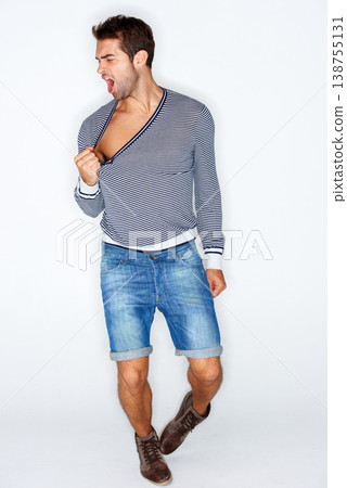Sexy, crazy and a man with fashion clothes on a white background with confidence. Shouting, young and a person, model or guy looking cool, stylish or trendy in clothing, shorts or hipster style 138755131